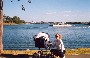 Andrew arrives home on Sydney harbour ferry - Sydney 2000 Olympic games site in background